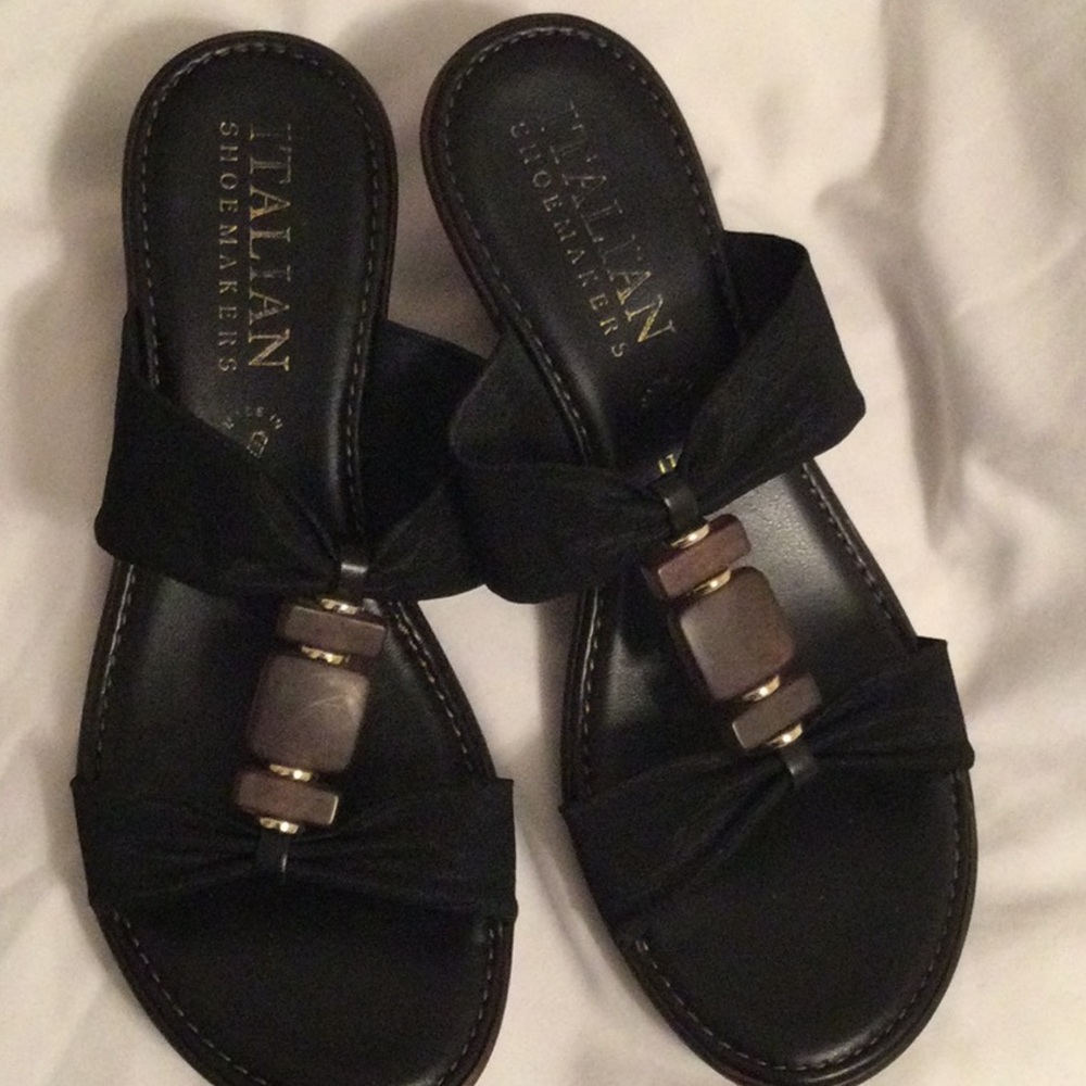 Women's black wedge.